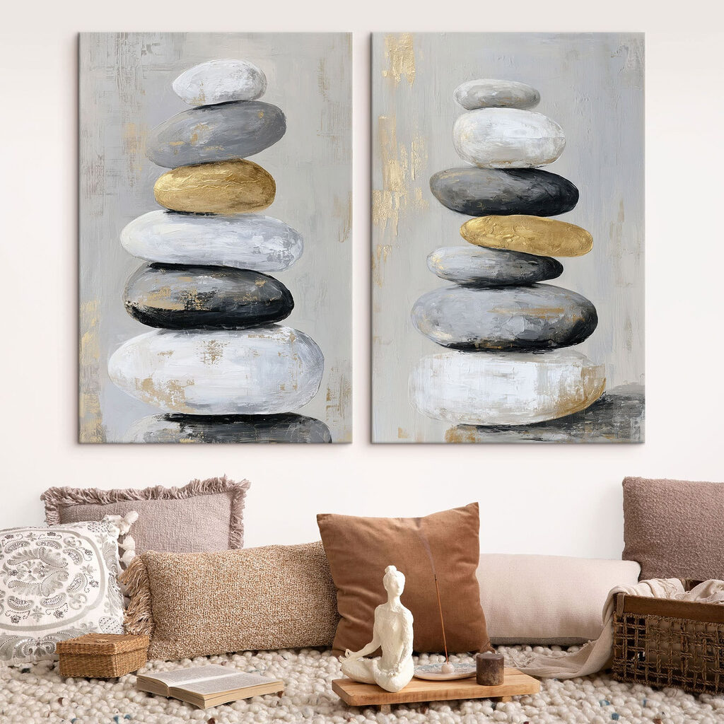 Schilderij van opgestapelde rotsen in een interieur