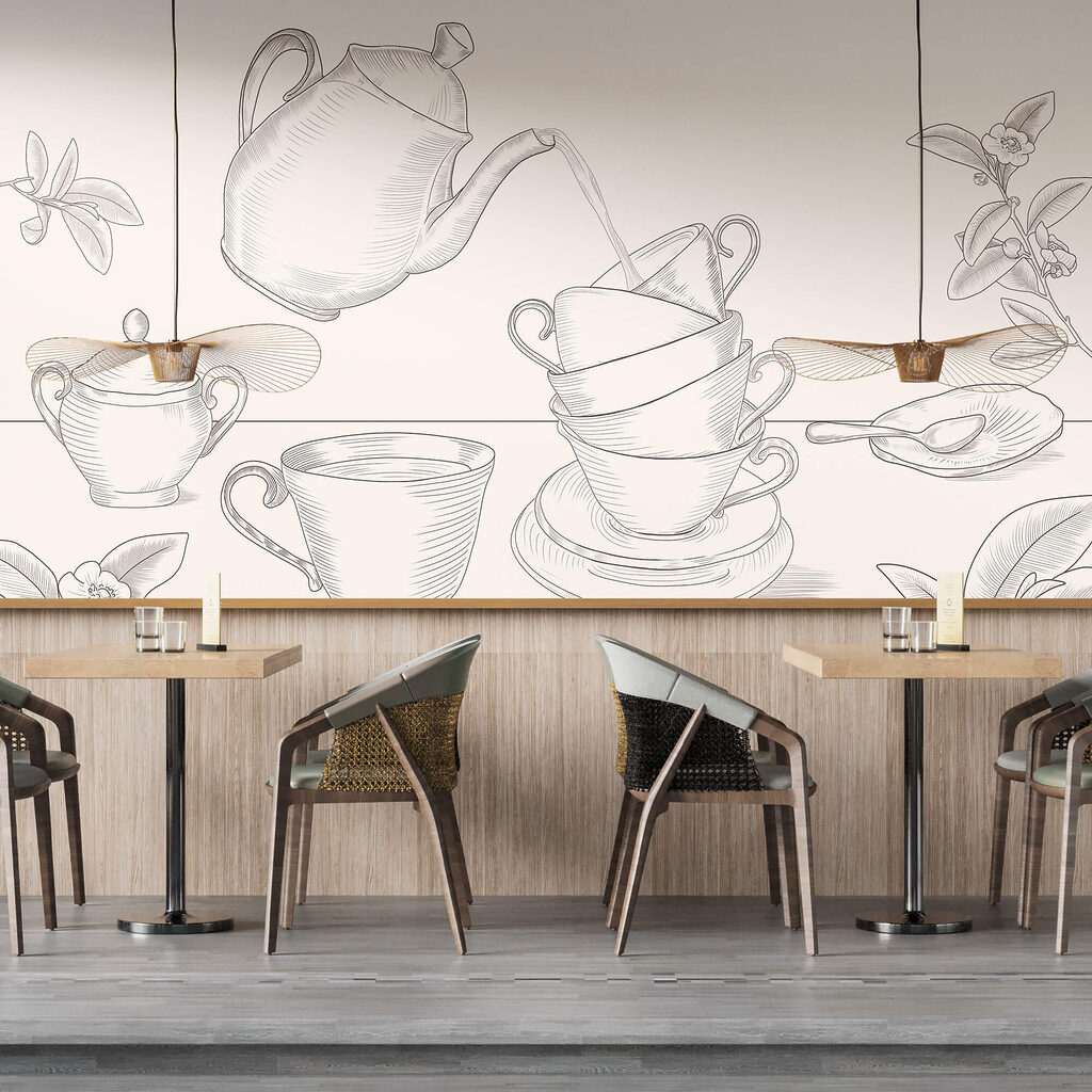 Theepot die in een stapel theekopjes schenkt in een interieur