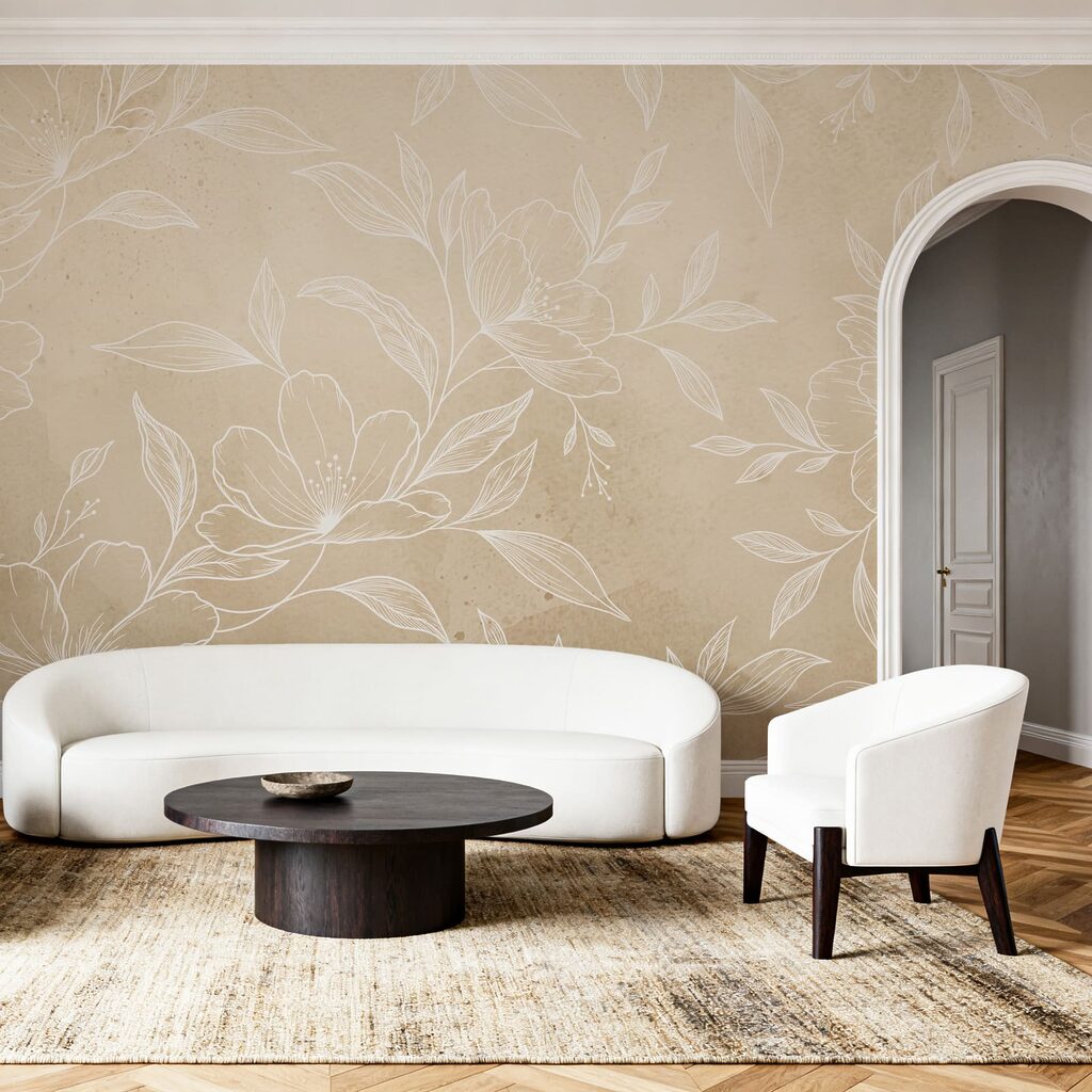 Witte bloemen en bladeren op een beige achtergrond in een interieur