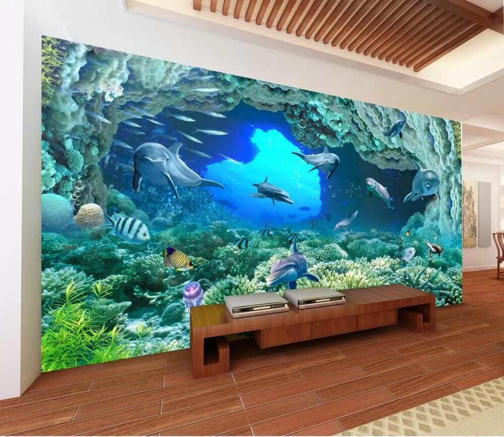 Groep dolfijnen en vissen onder water in een interieur
