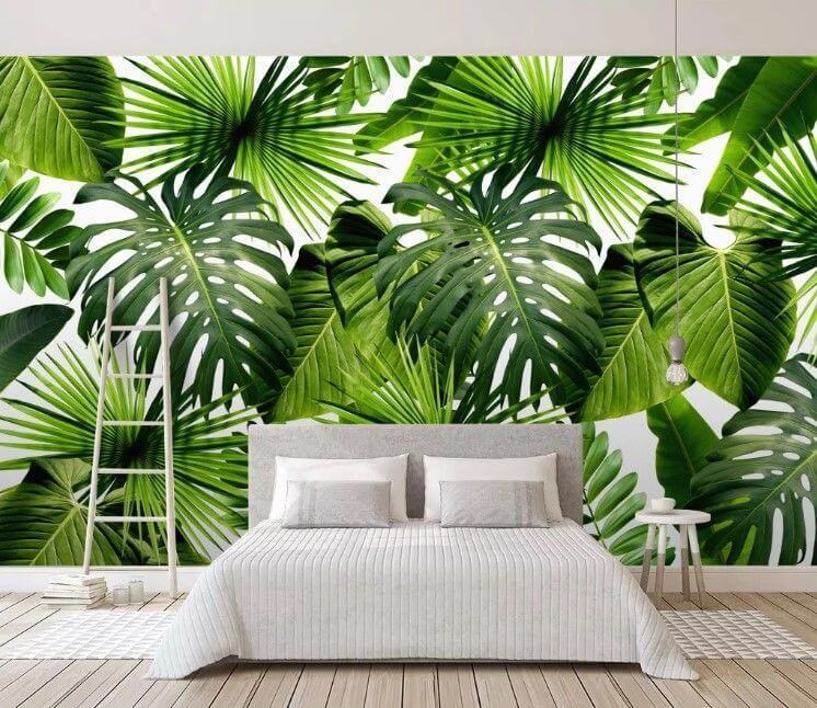 Groep groene bladeren in een interieur