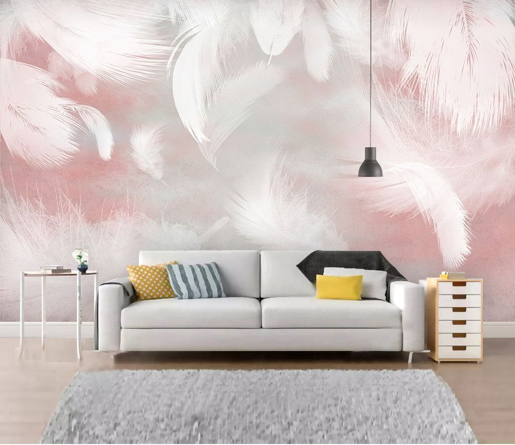 Witte veren op een roze achtergrond in een interieur