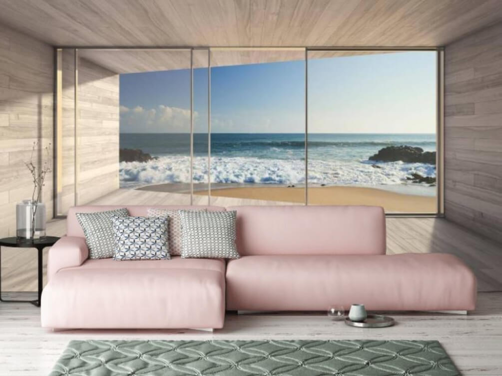 Kamer met grote glazen deuren en uitzicht op het strand — interieur 1