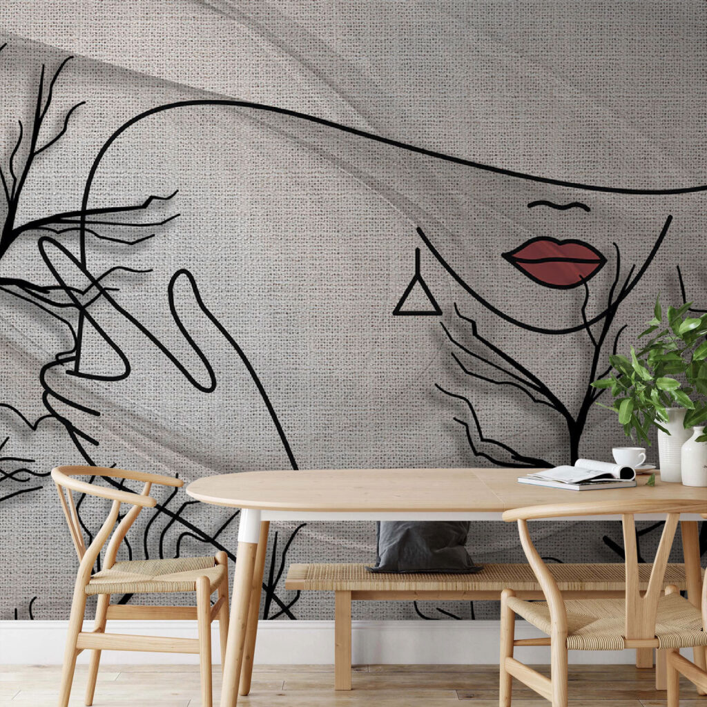 Tekening van een vrouw’s gezicht en een boom in een interieur