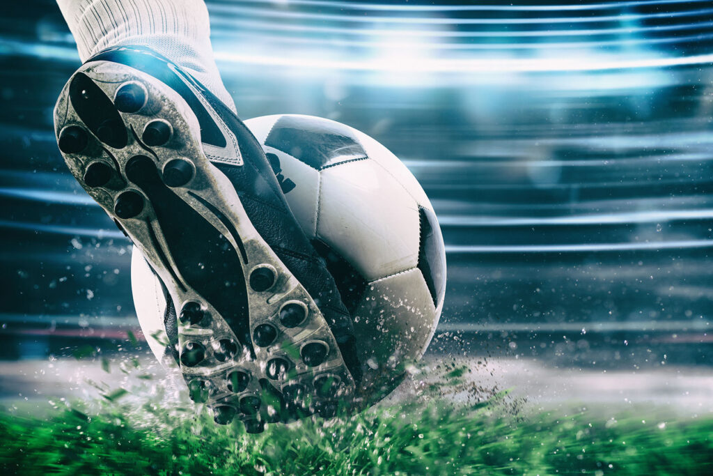 Voetbalschoen naast een voetbal — volledig ontwerp