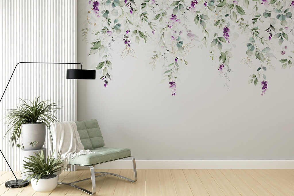 Een schilderij van bladeren en bloemen in een interieur