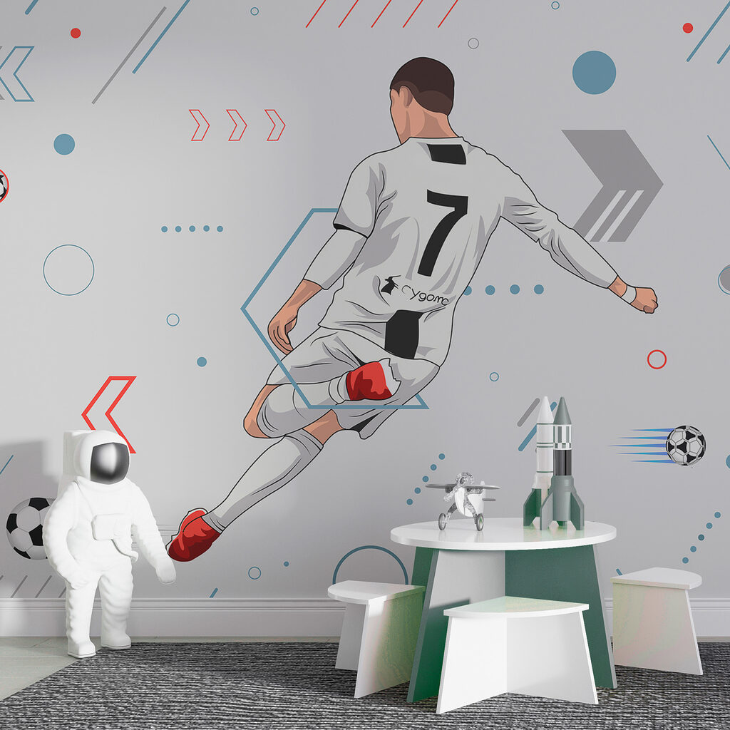 Een voetballer die een bal trapt in een interieur