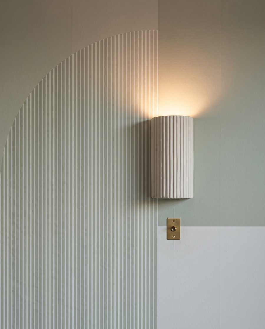 Ronde geometrie in bleekgroen — detail